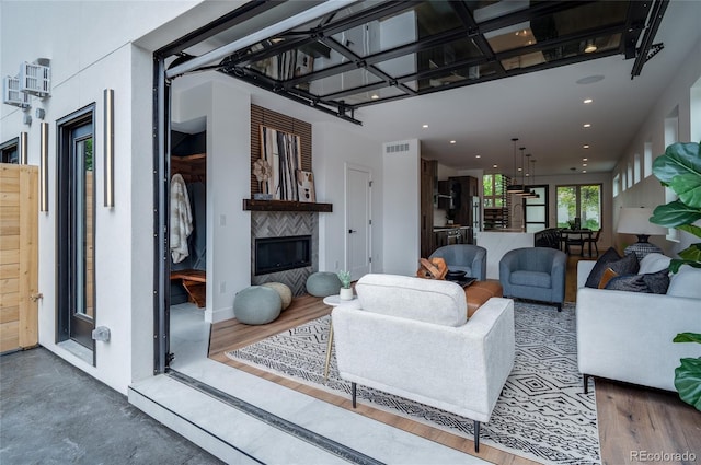 4474 Utica St, Denver, CO 80212 - living room featuring a glass covered fireplace