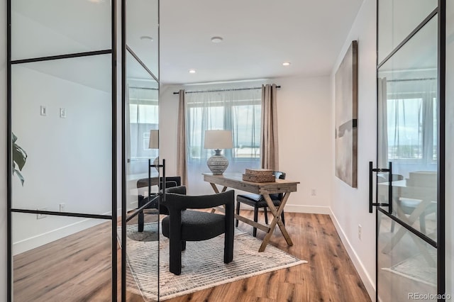 4474 Utica St, Denver, CO 80212 - home office with wood finished floors and recessed lighting