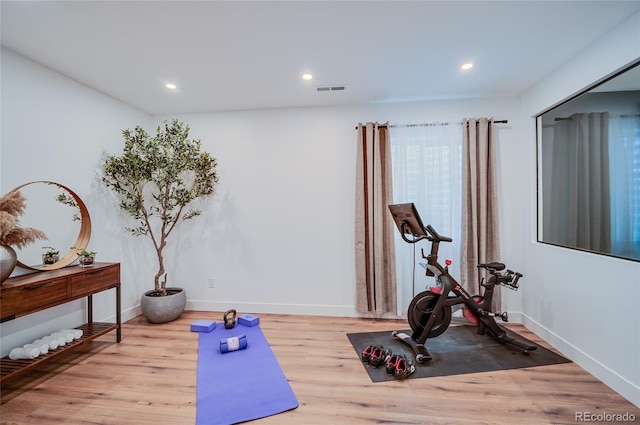 4474 Utica St, Denver, CO 80212 - exercise room featuring wood finished floors and recessed lighting