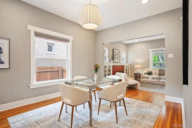 1532 Meade St, Denver, CO 80204 - dining space featuring baseboards, wood finished floors, and recessed lighting
