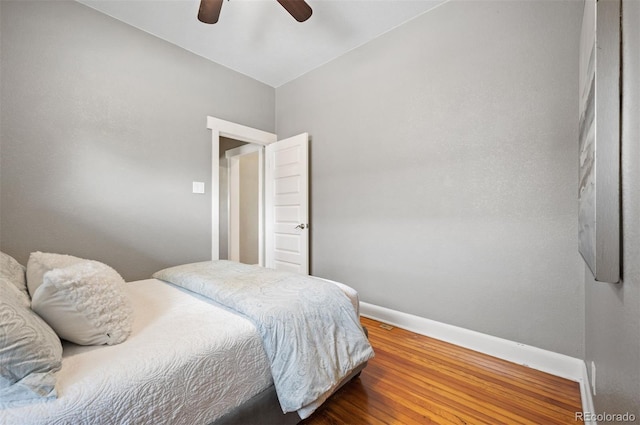 1532 Meade St, Denver, CO 80204 - bedroom with baseboards, wood finished floors, and ceiling fan