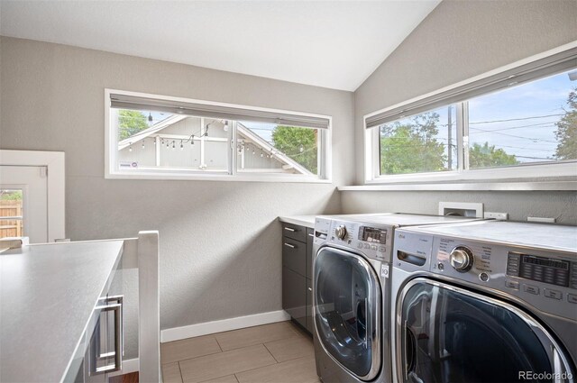 1532 Meade St, Denver, CO 80204 - laundry room with independent washer and dryer, baseboards, cabinet space, and a textured wall