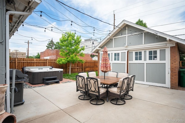 1532 Meade St, Denver, CO 80204 - fenced backyard featuring a hot tub, a patio, outdoor dining space, and a grill