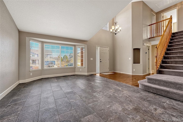 foyer entrance with an inviting chandelier