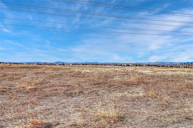 view of local wilderness with a mountain view and a rural view