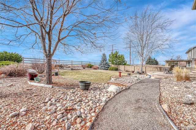 view of yard with a deck