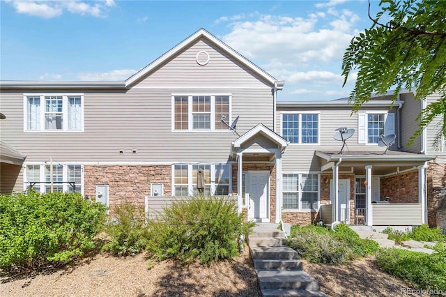 12766 Jasmine St Unit D, Thornton, CO 80602 - multi unit property featuring stone siding