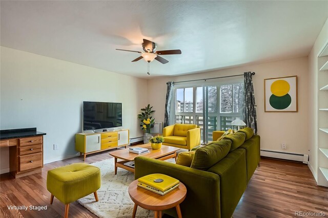 living room featuring a baseboard heating unit, wood finished floors, baseboard heating, and ceiling fan