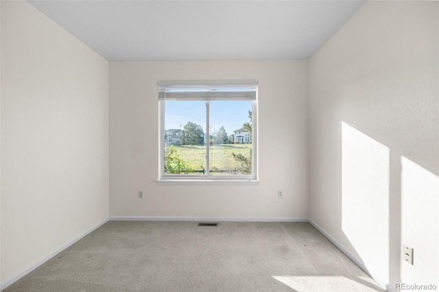 274 W Willowick Cir, Highlands Ranch, CO 80129 - spare room featuring light carpet and baseboards