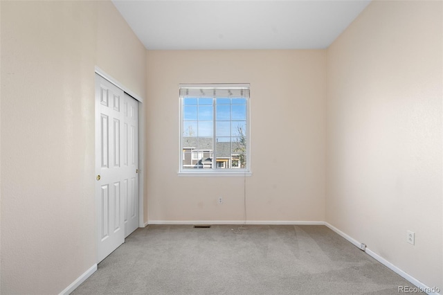 274 W Willowick Cir, Highlands Ranch, CO 80129 - unfurnished bedroom featuring carpet and a closet