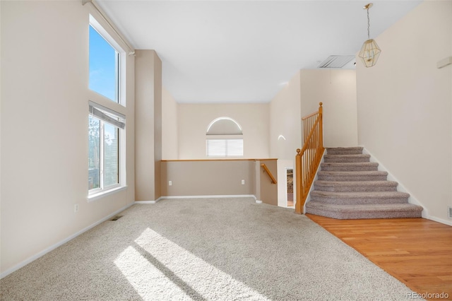 274 W Willowick Cir, Highlands Ranch, CO 80129 - unfurnished living room featuring carpet flooring