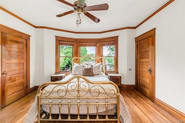 506 N Marion St, Denver, CO 80218 - bedroom with baseboards, light wood-style floors, ornamental molding, and ceiling fan