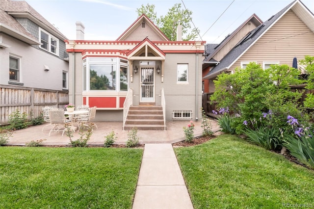 506 N Marion St, Denver, CO 80218 - view of front of house with entry steps and a patio