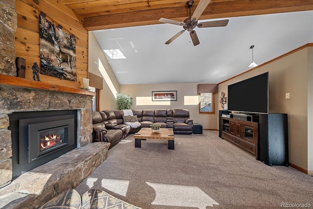 carpeted living room featuring vaulted ceiling, ceiling fan, a fireplace, and baseboards