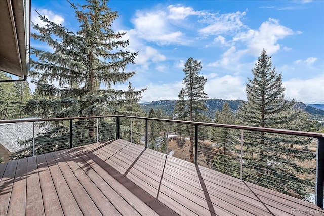 wooden terrace with a mountain view