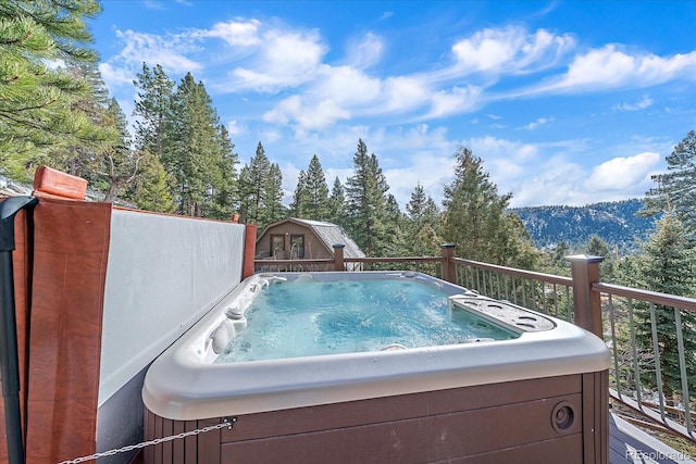 view of pool featuring a hot tub