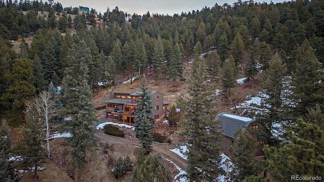 bird's eye view featuring a view of trees