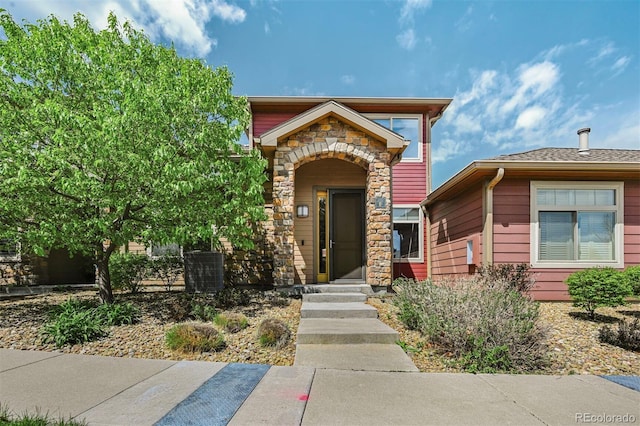 view of front facade with stone siding
