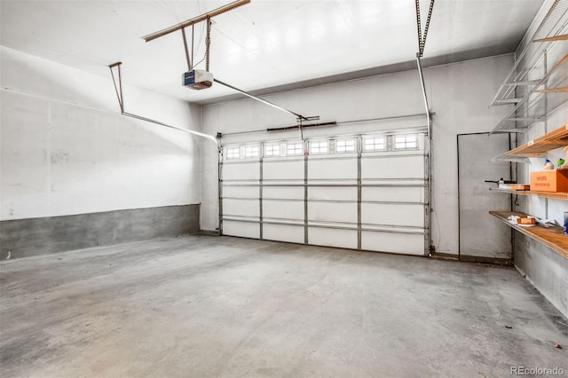 garage featuring a garage door opener
