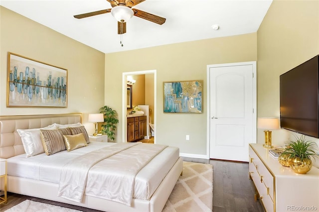 bedroom with baseboards, a ceiling fan, connected bathroom, and wood finished floors