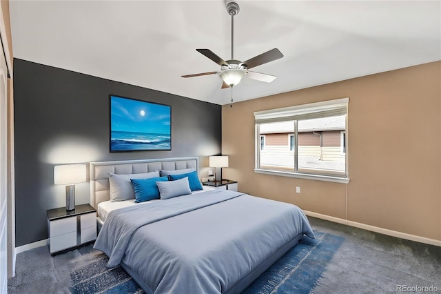 bedroom with carpet floors, baseboards, and ceiling fan