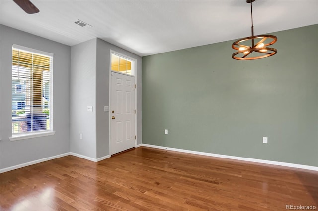 16062 E Geddes Dr Unit 150, Aurora, CO 80016 - foyer featuring wood finished floors, baseboards, a chandelier, and a ceiling fan