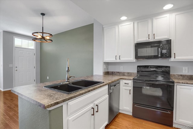 16062 E Geddes Dr Unit 150, Aurora, CO 80016 - kitchen with black appliances, a sink, a peninsula, white cabinets, and recessed lighting