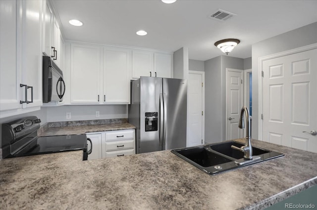 16062 E Geddes Dr Unit 150, Aurora, CO 80016 - kitchen with black appliances, a sink, white cabinets, and recessed lighting