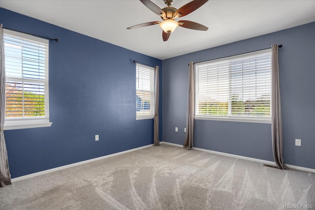 16062 E Geddes Dr Unit 150, Aurora, CO 80016 - empty room with ceiling fan, carpet floors, and baseboards
