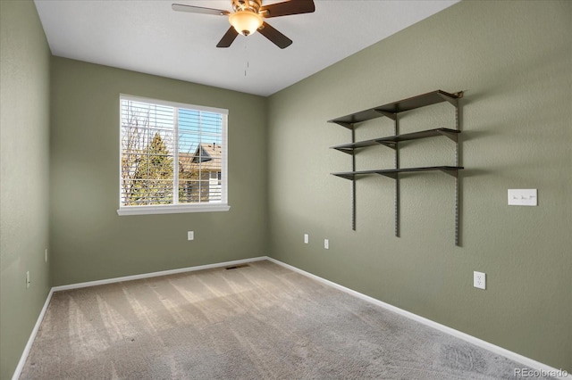 16062 E Geddes Dr Unit 150, Aurora, CO 80016 - empty room with ceiling fan, carpet flooring, and baseboards