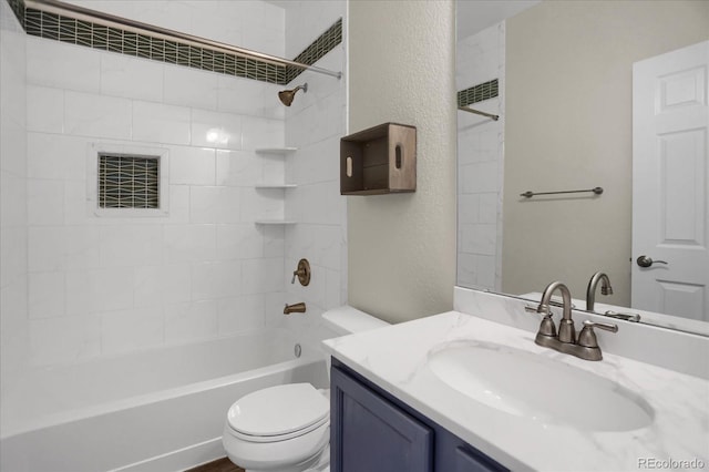 16062 E Geddes Dr Unit 150, Aurora, CO 80016 - full bath with a textured wall, toilet, shower / tub combination, and vanity