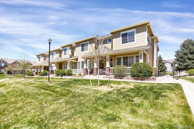 16062 E Geddes Dr Unit 150, Aurora, CO 80016 - view of front facade featuring a porch, a front lawn, and central AC unit