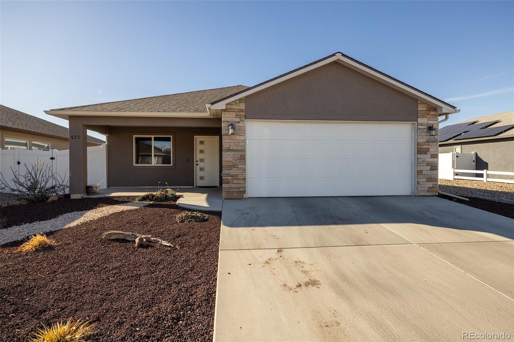 ranch-style house with a garage