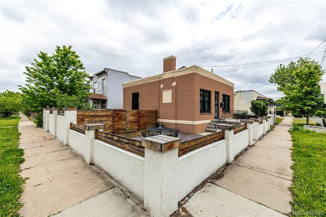 1803 E 36th Ave, Denver, CO 80205 - view of side of home with stucco siding