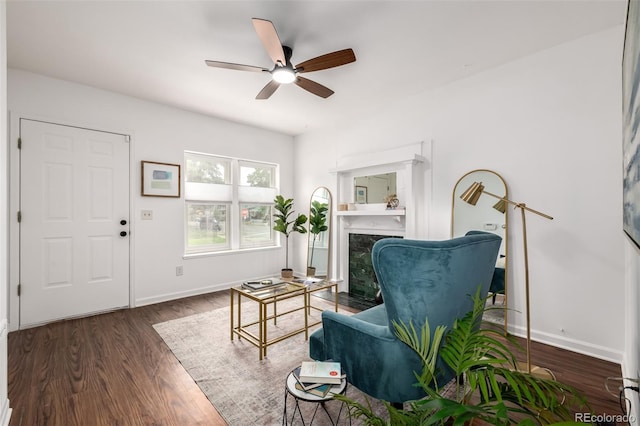 1803 E 36th Ave, Denver, CO 80205 - living room with a ceiling fan, wood finished floors, a fireplace, and baseboards