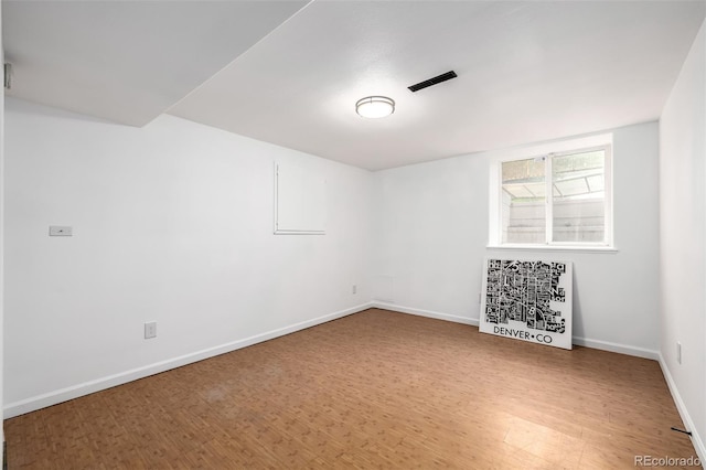 1803 E 36th Ave, Denver, CO 80205 - spare room with wood finished floors and baseboards