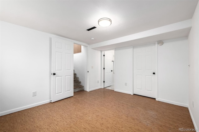 1803 E 36th Ave, Denver, CO 80205 - unfurnished bedroom featuring light wood-type flooring and baseboards