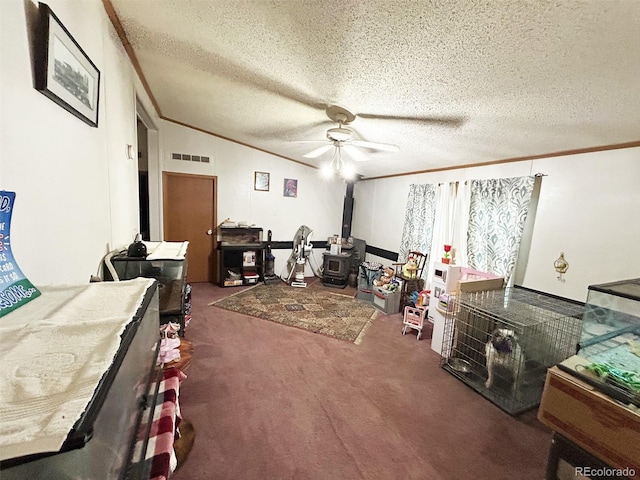 1130 Denver Ave, Saguache, CO 81149 - carpeted bedroom with crown molding, a textured ceiling, and a ceiling fan