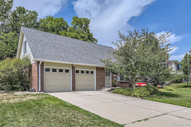 view of front of home with a garage and a front yard