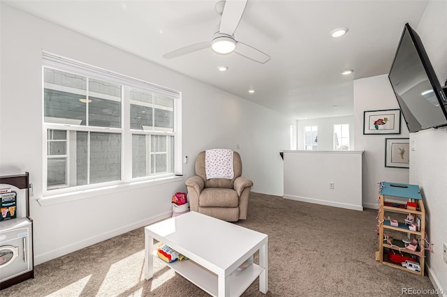 sitting room with a ceiling fan, recessed lighting, carpet flooring, and baseboards