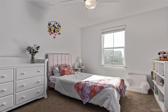 carpeted bedroom with a ceiling fan