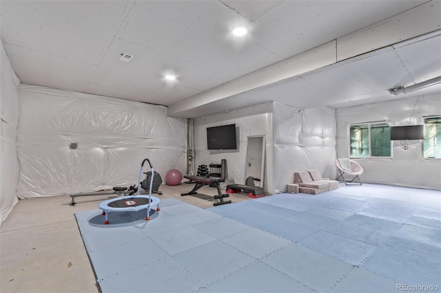 exercise room featuring visible vents