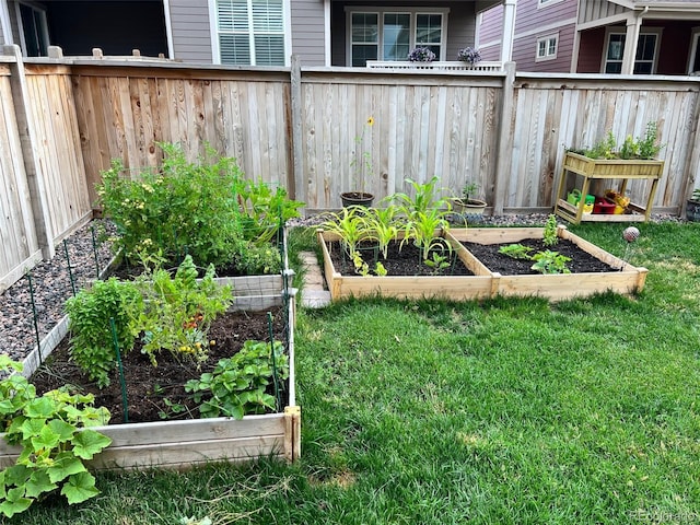 view of yard featuring a garden and fence