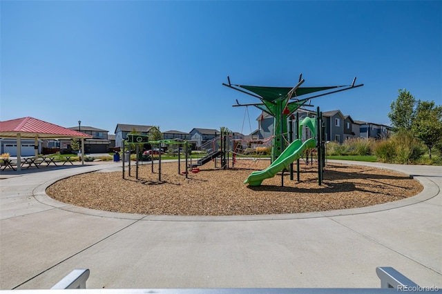 community play area with a residential view