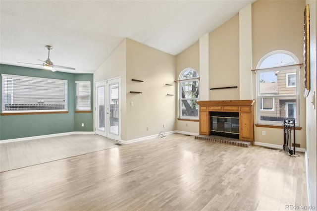 17943 E Bates Ave, Aurora, CO 80013 - unfurnished living room featuring high vaulted ceiling, a ceiling fan, wood finished floors, and plenty of natural light