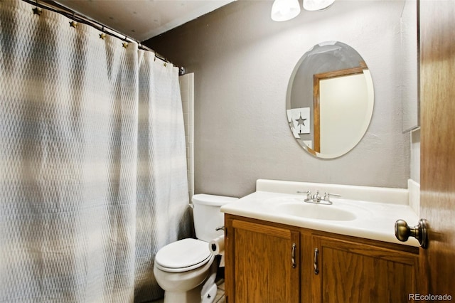 17943 E Bates Ave, Aurora, CO 80013 - full bathroom featuring toilet, vanity, and curtained shower