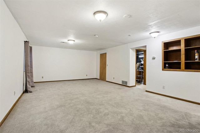 17943 E Bates Ave, Aurora, CO 80013 - finished below grade area with light carpet and baseboards