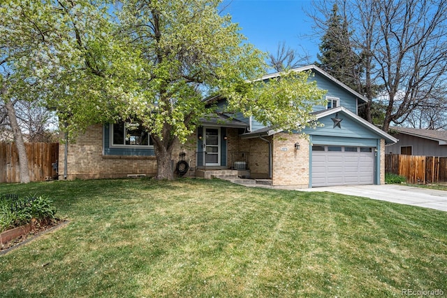 view of front of home with brick siding, fence, driveway, and a front lawn