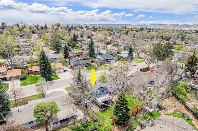drone / aerial view featuring a mountain view and a residential view