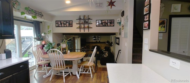 12175 W 68th Pl, Arvada, CO 80004 - dining area with wood finished floors and stairway